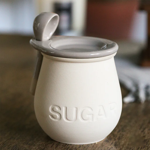 Botella de cerámica vintage para especias con tapa