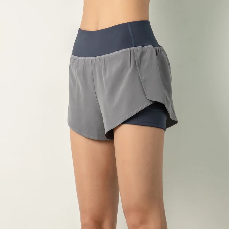 Pantalones cortos para correr con bolsillos laterales y doble pantalón corto