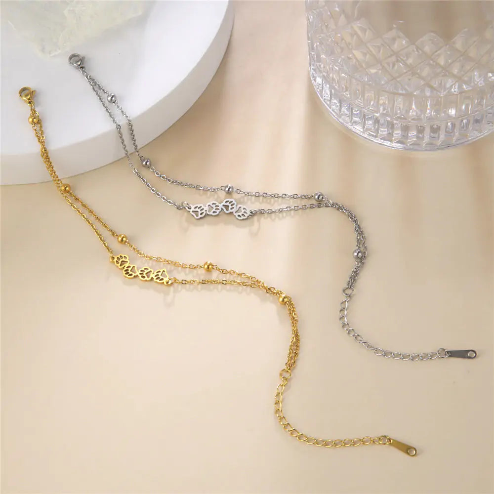 Pulsera de mano con forma de pata de animal