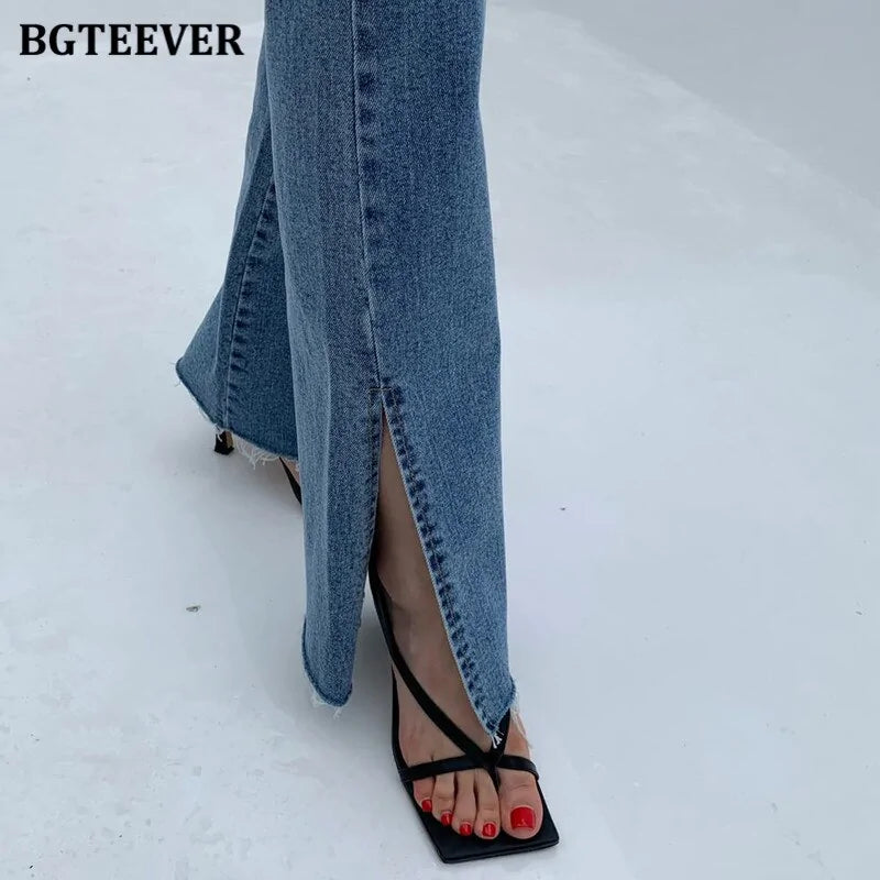 Pantalones vaqueros acampanados con doble botón para mujer
