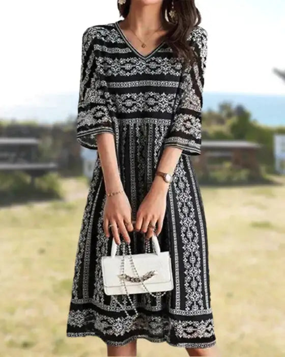 Vestido estampado con escote en pico