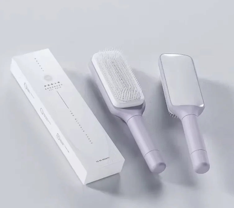 Peine masajeador retráctil con cojín de aire: desenreda, reduce el frizz y masajea el cuero cabelludo
