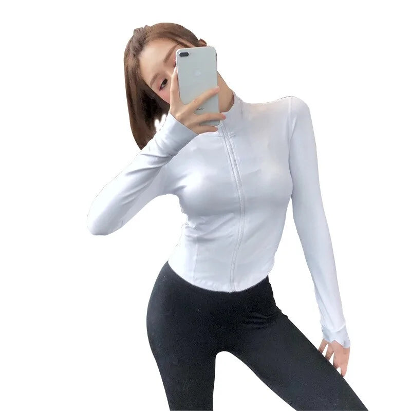 Tops cortos deportivos de manga larga con cremallera ajustada para mujer para correr en el gimnasio