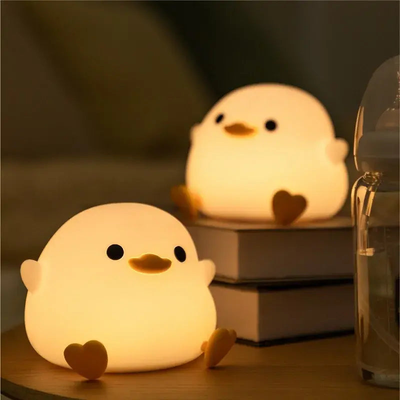 Luz de noche LED con forma de pato de dibujos animados