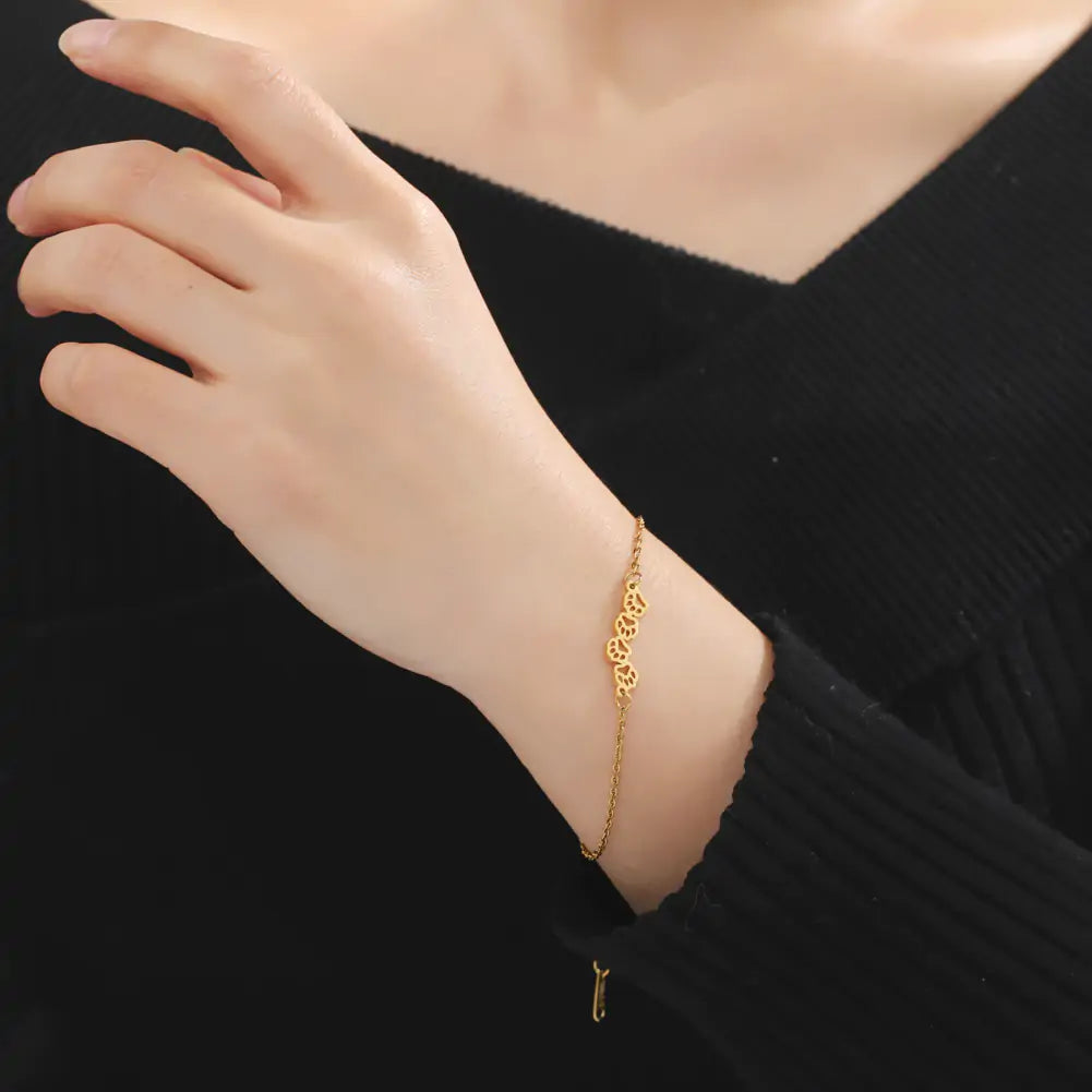Pulsera de mano con forma de pata de animal