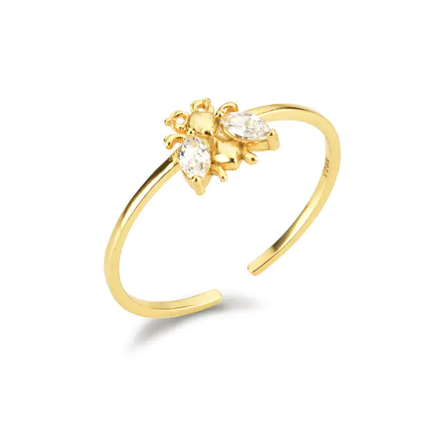 Colección de anillos y pendientes de abejas de invierno