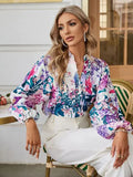 Camisa elegante con mangas abullonadas para mujer