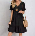 Vestido midi con escote en V y color liso
