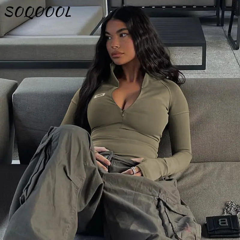 Camiseta con cremallera y manga larga para mujer