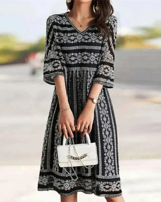 Vestido estampado con escote en pico