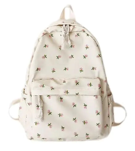 Mochila escolar blanca con estampado floral