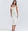Vestido midi con hombros descubiertos y borlas de perlas